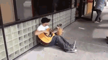 Within Moments, Two Complete Strangers Came And Joined The Guitarist. GIF - Singing Strangers Guitar GIFs