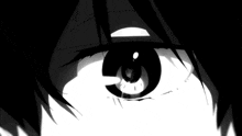 a close up of a person 's eye with a tear coming out of it