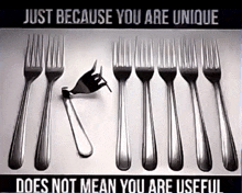 a row of silver forks with the words just because you are unique does not mean you are useful underneath