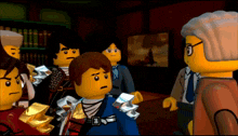 a group of lego figures are standing in a room with a man wearing glasses