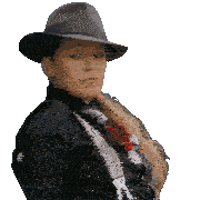 a woman wearing a hat and suspenders with a red rose