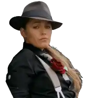a woman wearing a hat and suspenders with a red rose