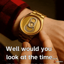a gold watch that looks like a can of soda