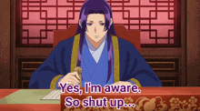 a man sitting at a desk with the words yes i 'm aware so shut up written below him