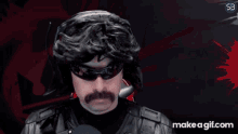 a man with a mustache is wearing headphones and sunglasses