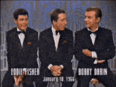 three men in tuxedos are sitting next to each other with the date january 10 1966 on the bottom