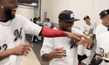 a baseball player wearing a number 9 jersey
