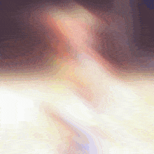 a blurred image of a person 's face with a white background