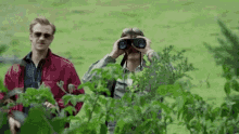 Kim Jongun Spy GIF - Kim Jongun Spy Binoculars GIFs