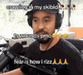 a man wearing headphones and a hat is crawling in my skibidi