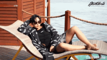 a woman is laying on a lounge chair with the website thisisakate written on the bottom