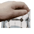 a close up of a person 's hand holding a piece of paper with a white background .