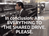 a man in a suit stands in front of empty shelves in a grocery store and says in conclusion