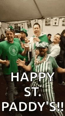 a group of men are celebrating st. paddy 's day and dancing in a tent .
