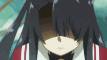 a girl with long black hair is covering her face