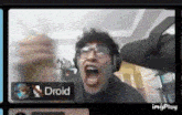 a man wearing headphones is making a funny face in a video call with drold
