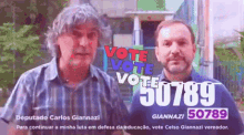 two men are standing next to each other in front of a sign that says vote