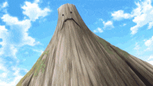 a large tree stump with a face on it