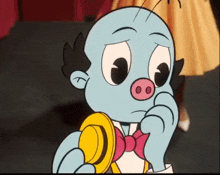 a cartoon character with a pink nose and a bow tie holds a yellow object