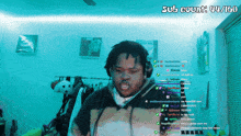 a man in a room with a sub count of 44/60