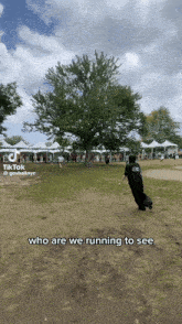 a person running in a field with the words " who are we running to see " on the bottom