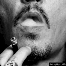 Silvan Giger Johnny Depp GIF - Silvan Giger Johnny Depp Smoking GIFs
