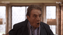a man with a surprised look on his face is featured on hulu