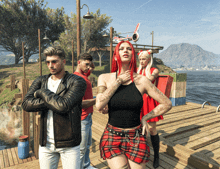 a group of people standing on a dock with a helicopter flying overhead