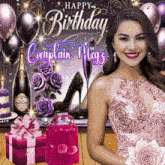 a woman in a pink dress holds a bouquet of purple roses