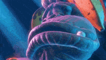 a close up of a statue of liberty with a banana on it