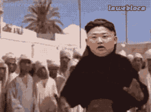 a cartoon of kim jong un standing in front of a crowd with the caption lawebloca above him