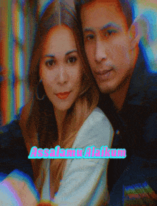 a man and a woman are posing for a picture with the words assalamualaikum written in blue