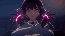 a close up of a person 's face with purple lights coming out of her eyes .