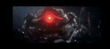 a close up of a robot with a red light on it 's head .
