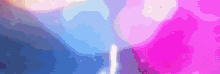 a purple and blue background with a few white spots