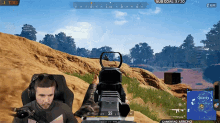 a man is playing a video game with a score of 138
