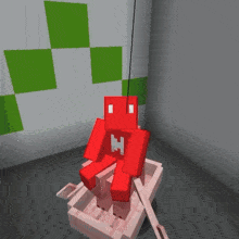 a red minecraft character with the letter h on its head