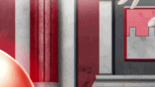 a person is holding a red object in a room