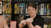 a man is holding a book that says would you still love me