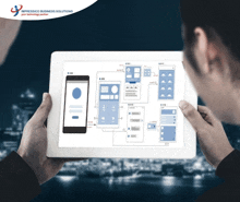 a person holding a tablet that says impressico business solutions on the top