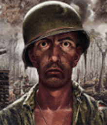 a soldier wearing a helmet is looking at the camera