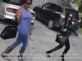 two women are standing next to each other on a street .