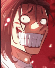 a close up of a person 's face with a huge smile