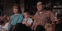 Blast From The Past Christopher Walken GIF - Blast From The Past Christopher Walken Watching Tv As A Family GIFs