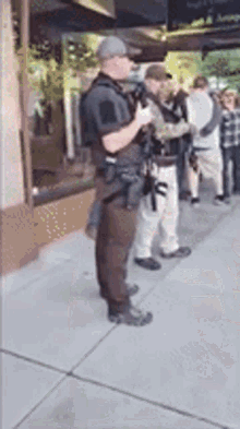 Armed Protest GIF - Armed Protest Hand Shake GIFs