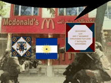 soldiers in front of a mcdonald 's with a sign that says de koningin aan het 2e regiment infanterie van linie
