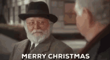 Merry Christmas Bearded Man GIF - Merry Christmas Bearded Man Seasons Greetings GIFs