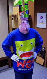 a person is wearing a blue sweater that says we on it