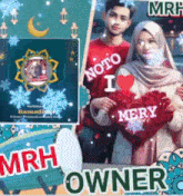 a couple holding a sign that says merry
