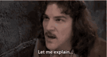 a man with long hair and a mustache says " no there is too much "
